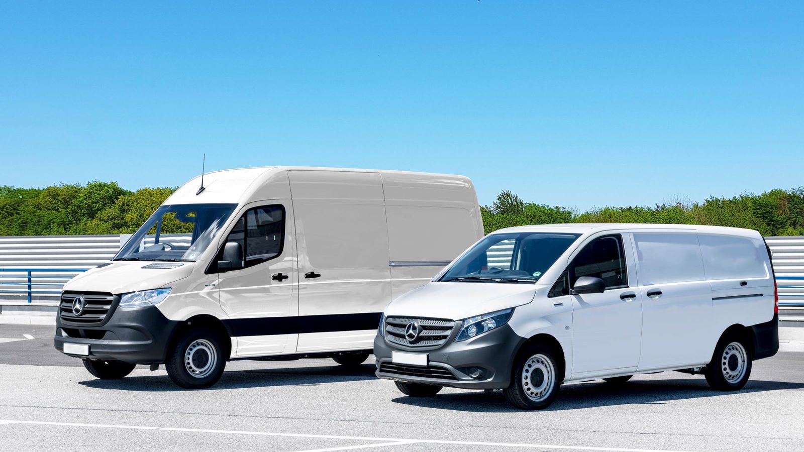 Two Safe Route Logistics Sprinter cargo vans parked under clear skies
